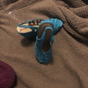 Worn once.  Needs a new home. Suede Wedge shoes